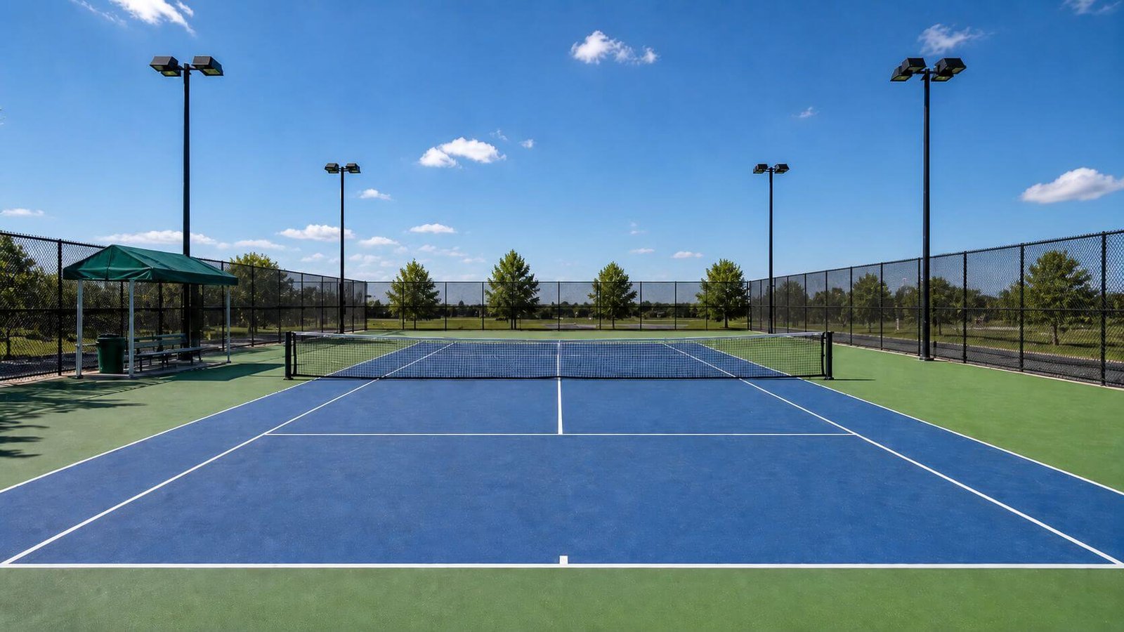 Workers painting custom marking lines on an indoor sports court
